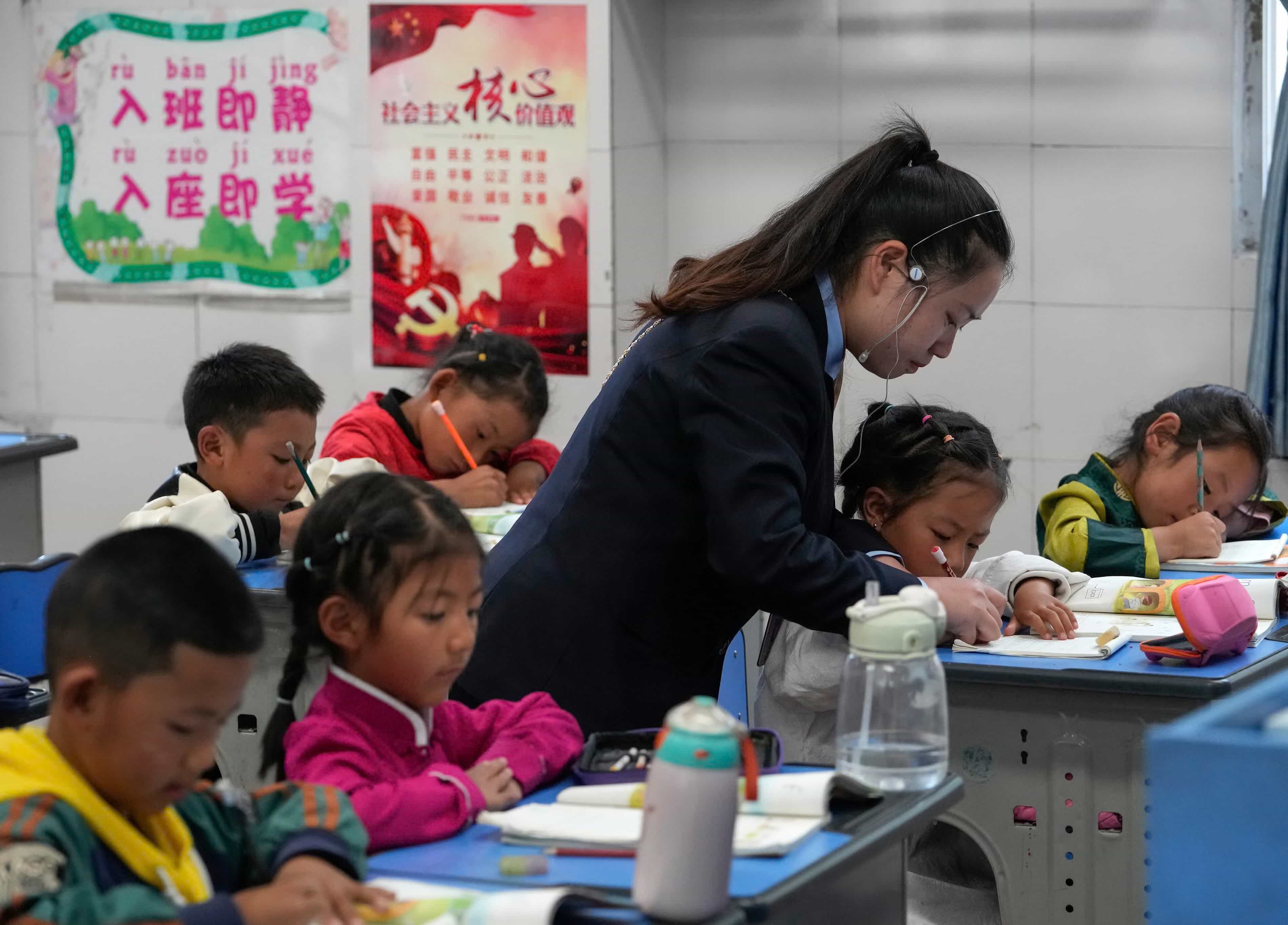 ‘They have built a machine that pulls out their mother tongue’: why Tibet’s children think they are Chinese